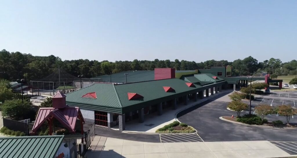 Insanity Complex in Madison, Alabama: Indoor offerings include a full arcade, rollerskating, rock wall climbing, laser tag, birthday party rooms, and event space with seating for several hundred people.