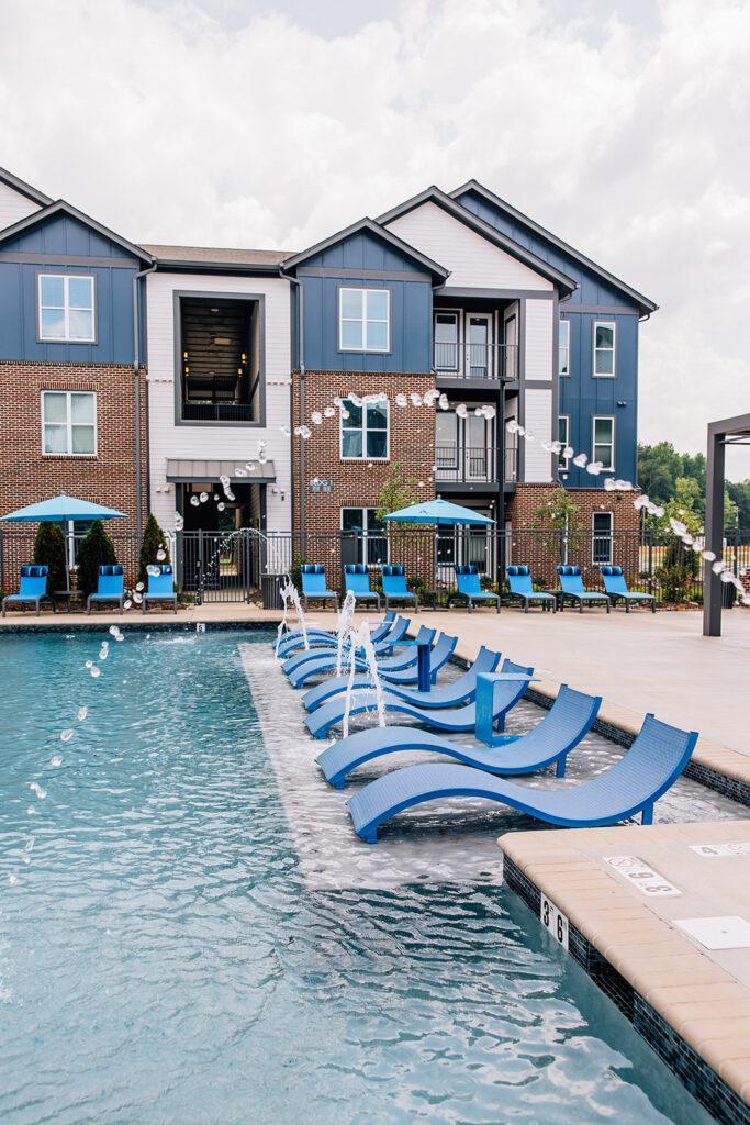 1010 Elliston | Apartments in Madison, Alabama | Amenities include a 24/7 state-of-the-art expansive fitness center, a large, luxurious pool, a business center, a complimentary coffee and tea bar, several indoor and outdoor gathering areas, grilling stations, and more. 